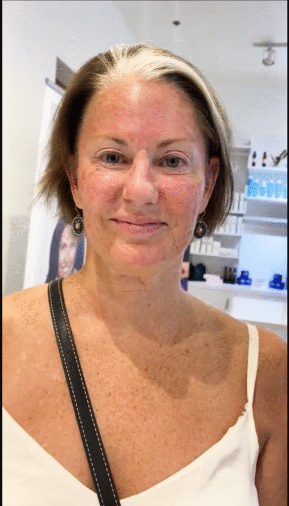 Smiling woman in a beauty salon.